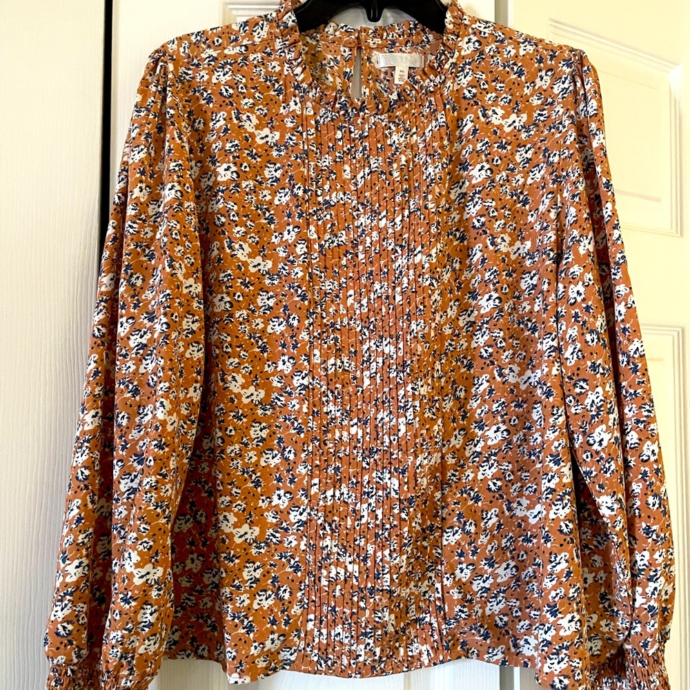 NWOT. Fun blouse. Ruffles and flowy